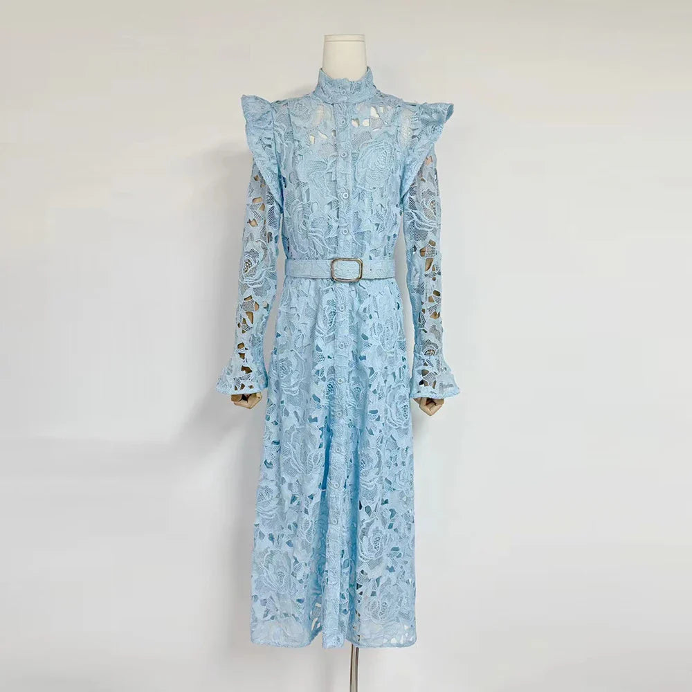 Light blue lace dress on a mannequin against a white background