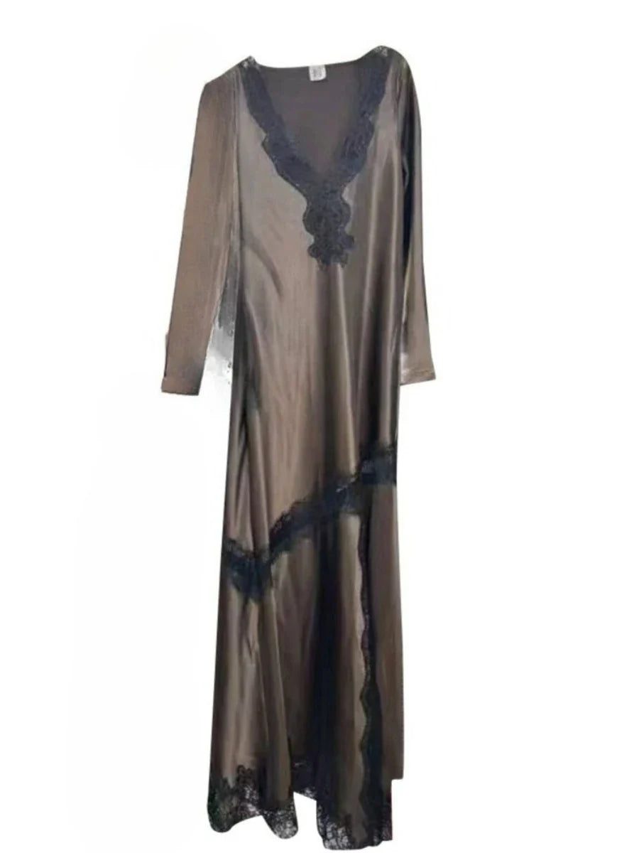 Long brown dress with lace details on a white background