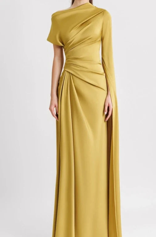 Mustard yellow evening gown on a white background