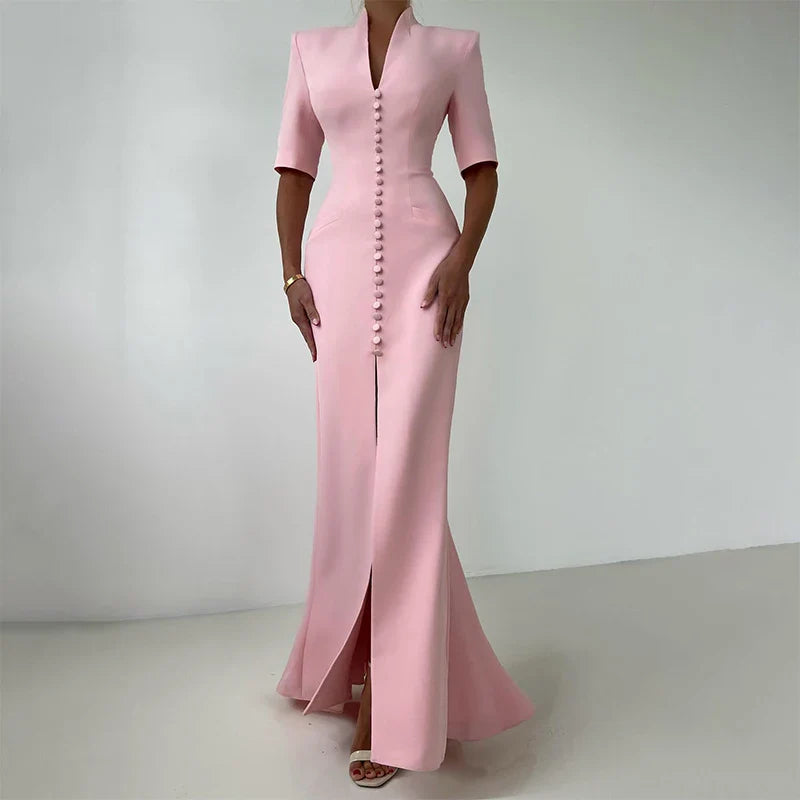 Pink dress with a high slit on a white background