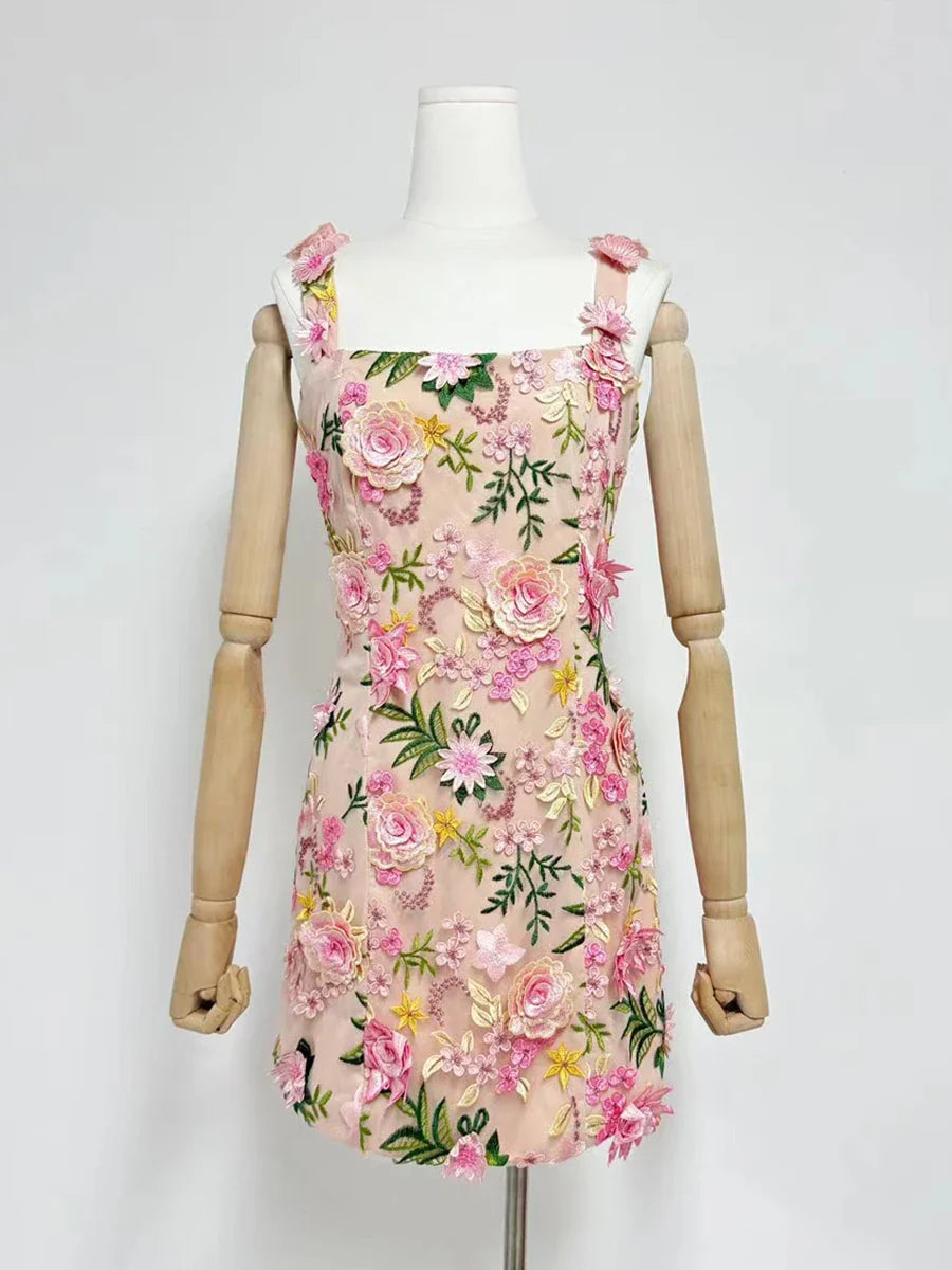 Floral dress on a mannequin against a white background