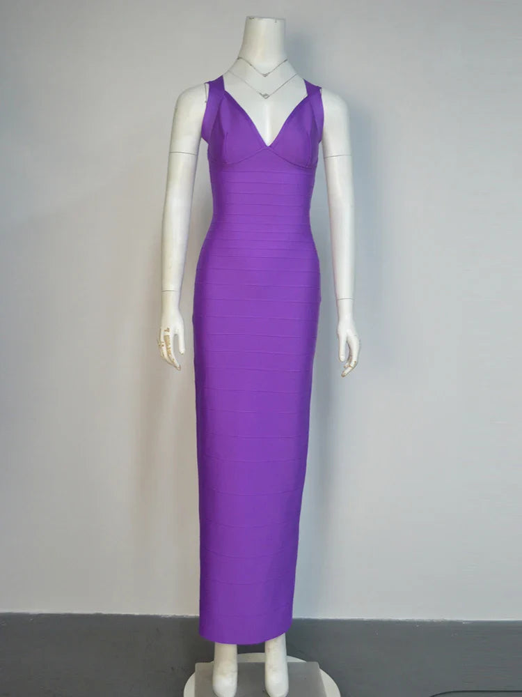 Purple evening gown on a mannequin against a plain background