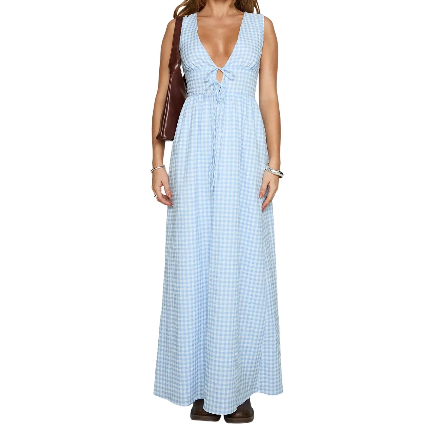 Woman wearing a blue checkered dress on a white background