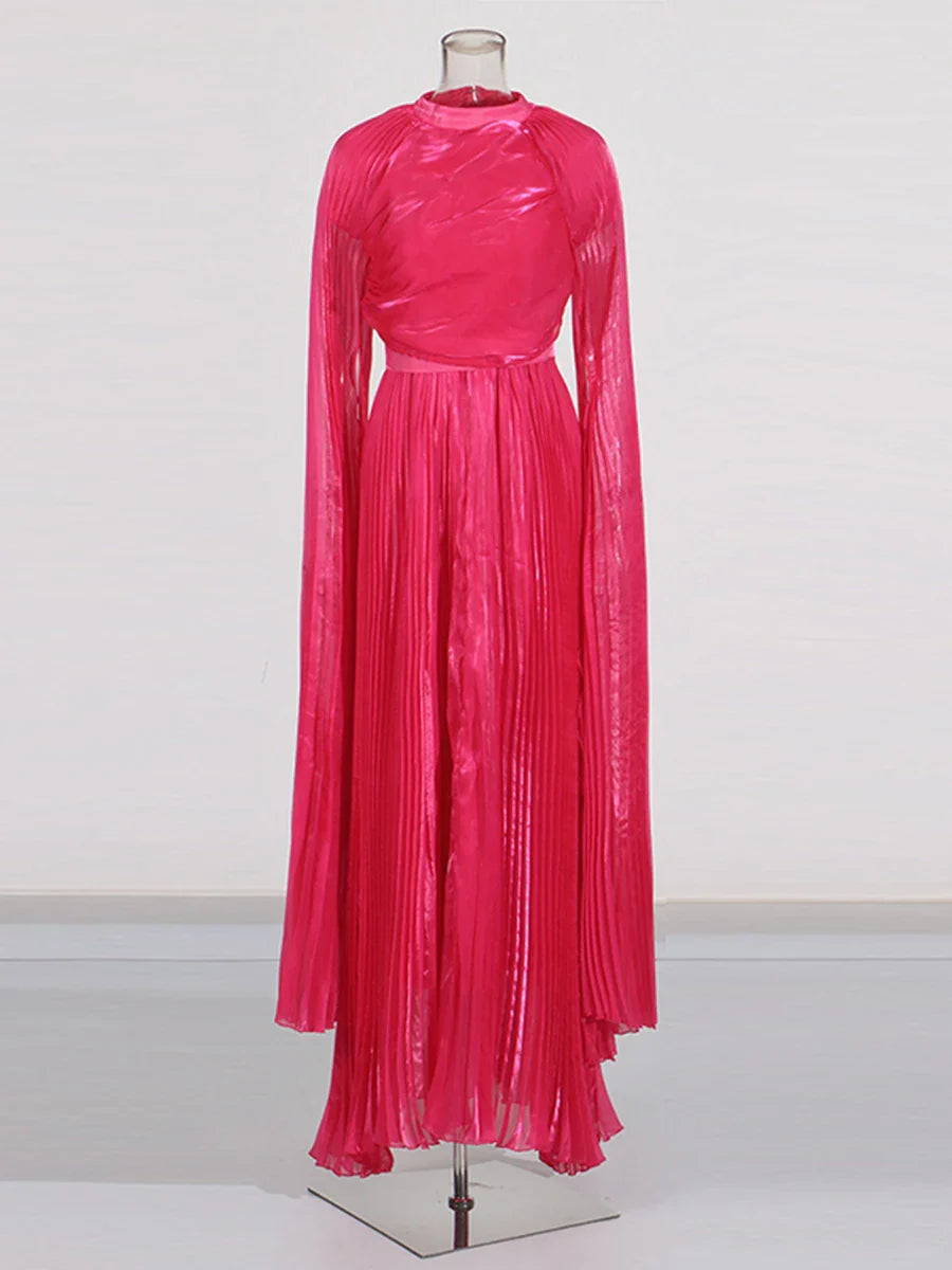 Pink pleated dress on a mannequin against a white background