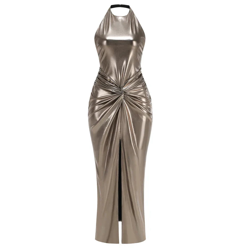 Metallic halter neck dress with a front slit on a white background