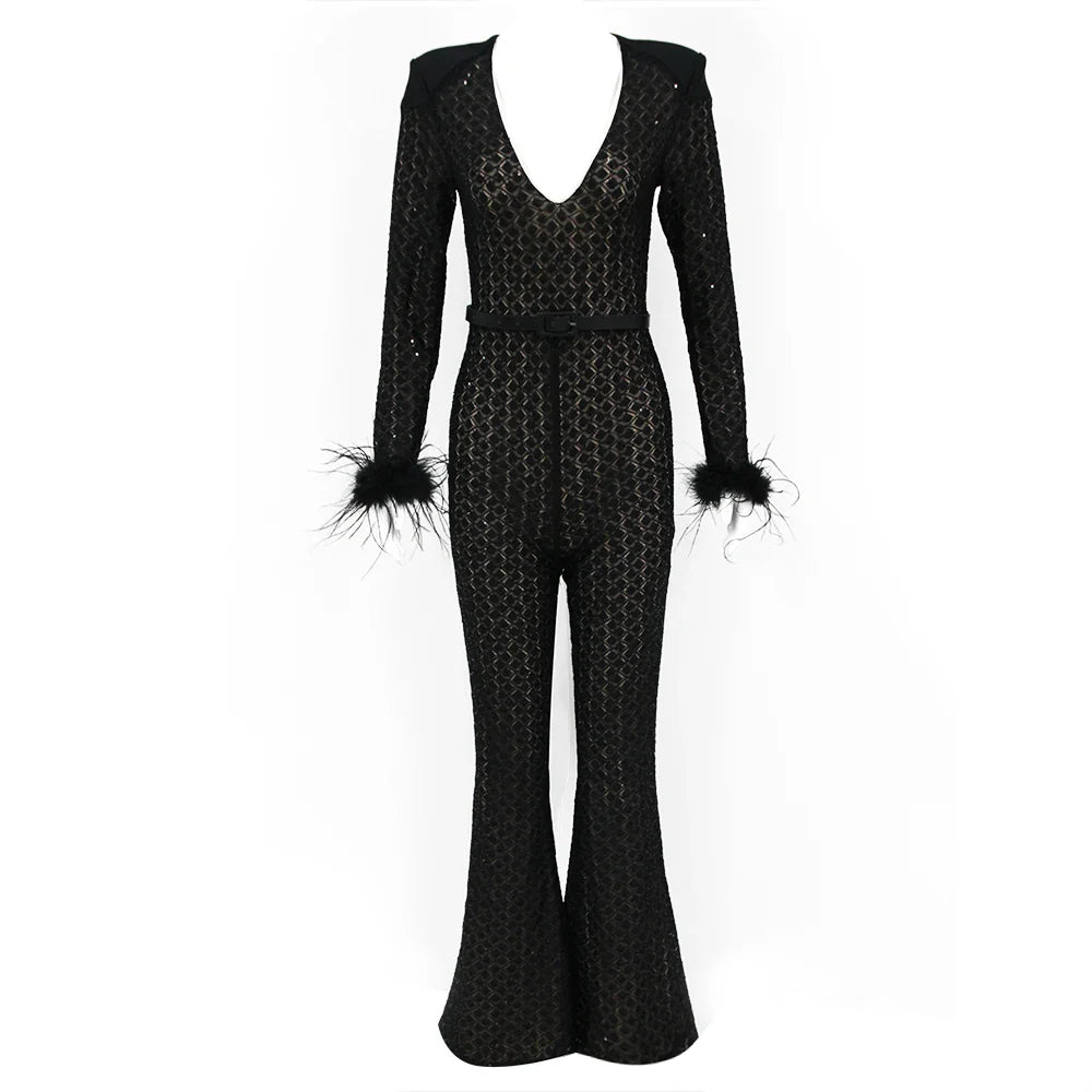 Black patterned jumpsuit with feathered cuffs on a white background