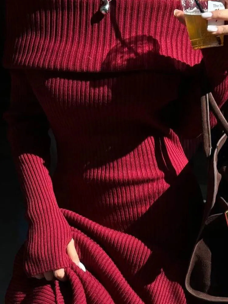 Red sweater with a blurred background