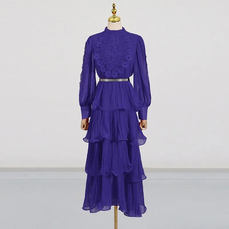 Purple dress on a mannequin against a white background