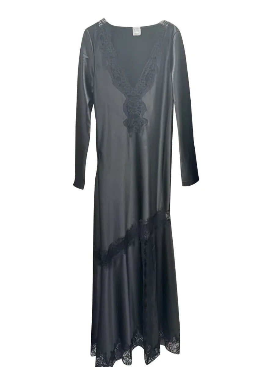 Long-sleeve dress with lace detailing on a white background