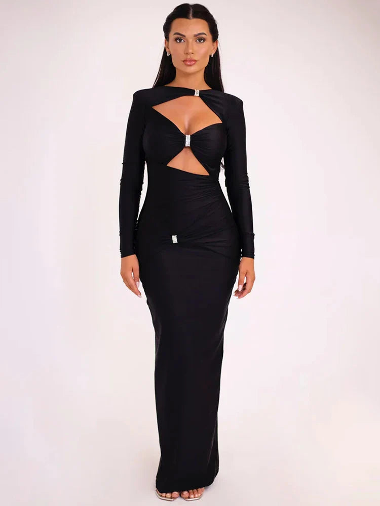Black long-sleeve dress with cut-out design on a white background