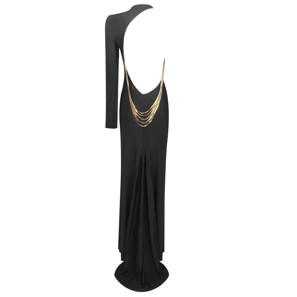 Black one-shoulder dress with gold chain detail on a white background