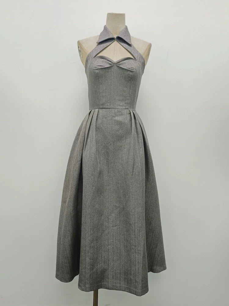 Gray dress on a mannequin against a white background
