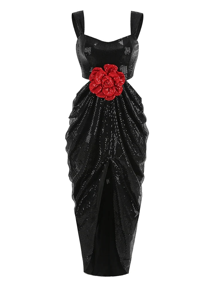 Black evening gown with a red floral embellishment on a white background