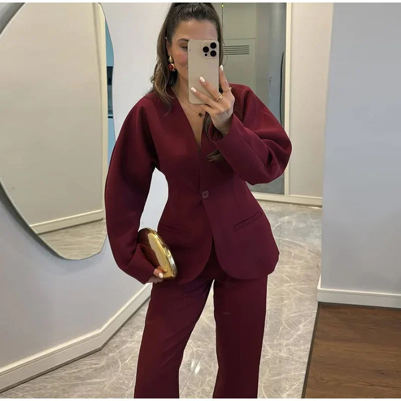Power Silhouette – Burgundy Boss Suit with Tailored Curve Fit