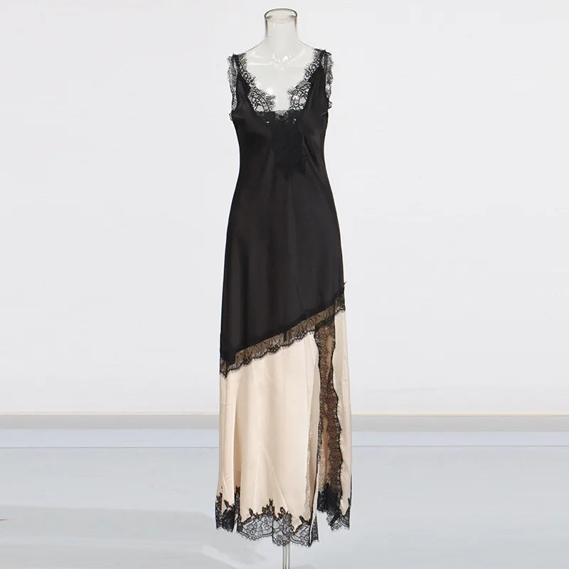 Black and beige dress with lace details on a mannequin