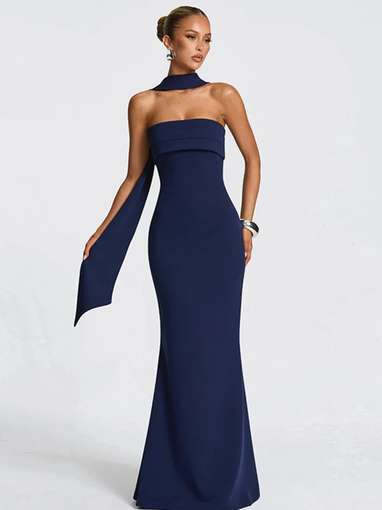 Minimal evening dress designed with clean structure 