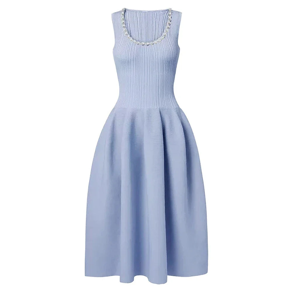 Light blue dress with decorative neckline on a white background