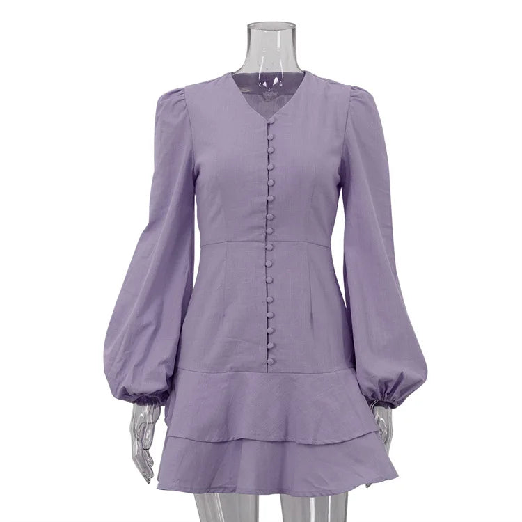 Lavender dress on a mannequin against a white background