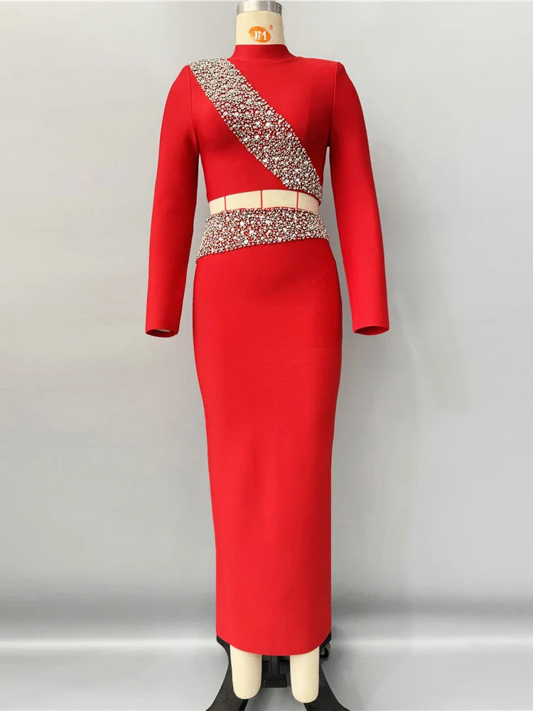 Red dress with embellished top on a mannequin against a gray background