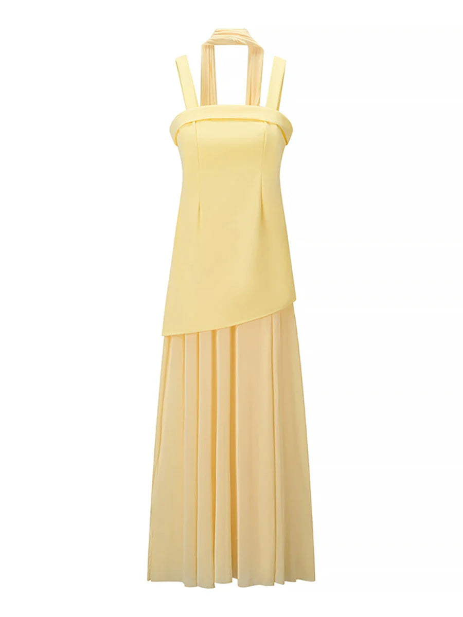 Yellow dress with a pleated skirt