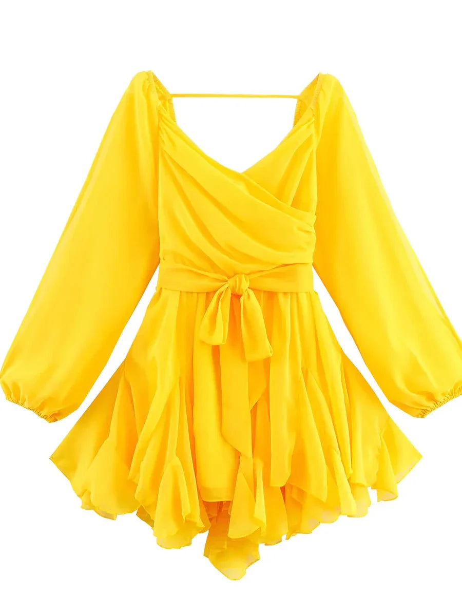 Yellow dress with long sleeves on a white background