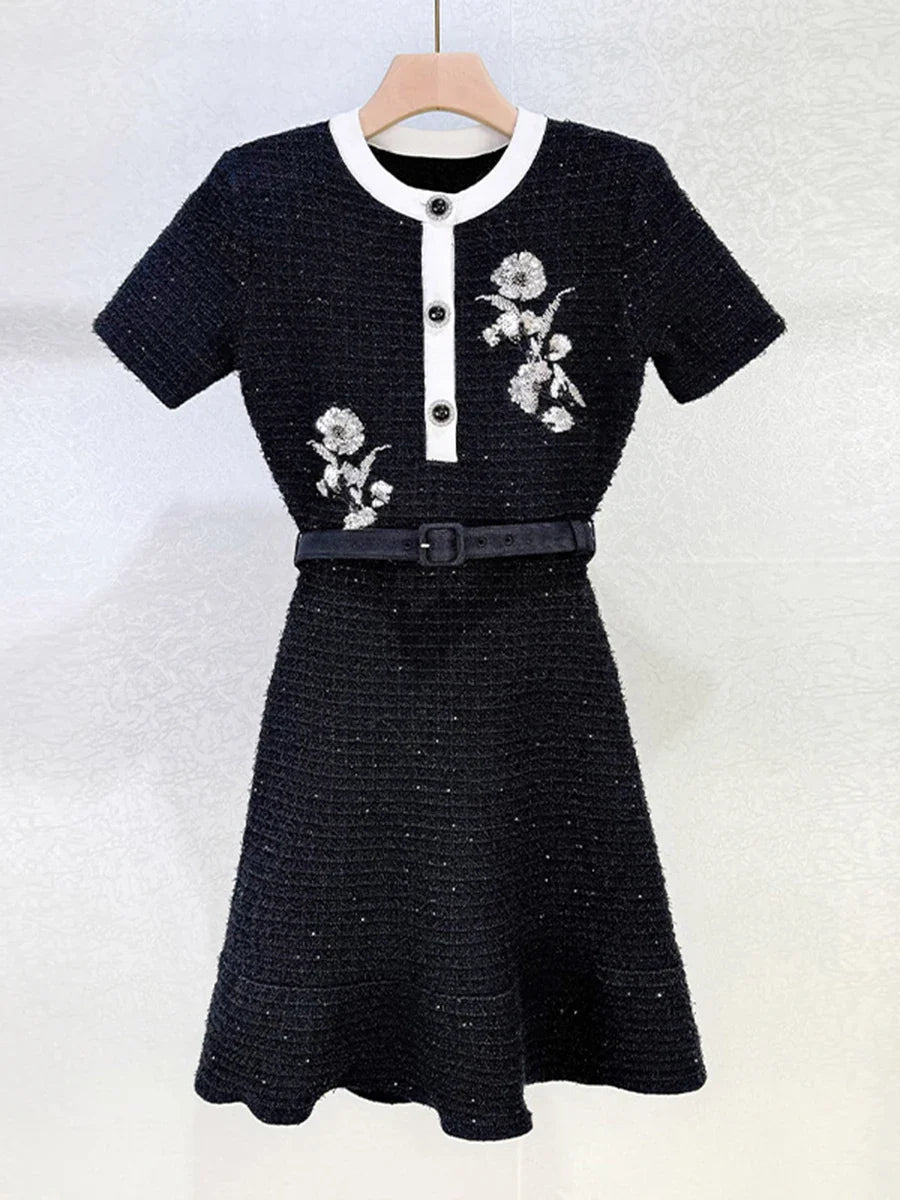 Round neck mini dress with refined textured detailing