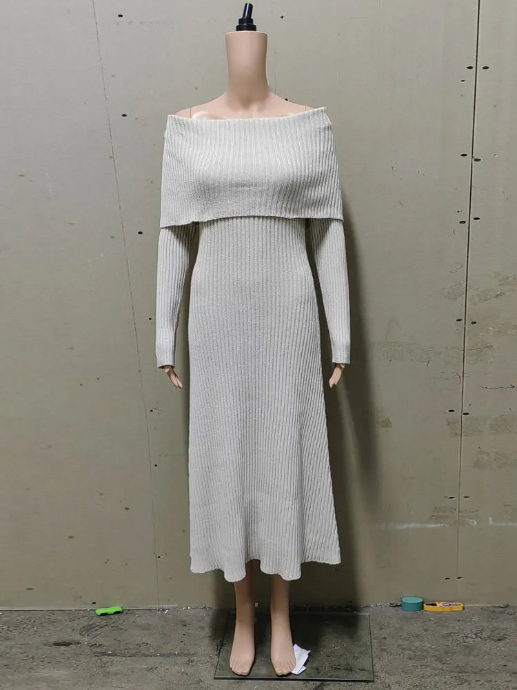 Mannequin wearing a light gray off-shoulder dress against a plain background