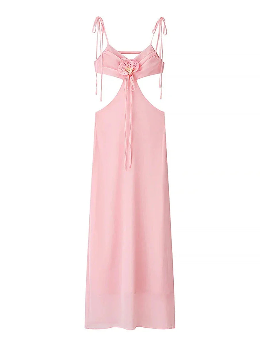 Pink slip dress with thin straps on a white background