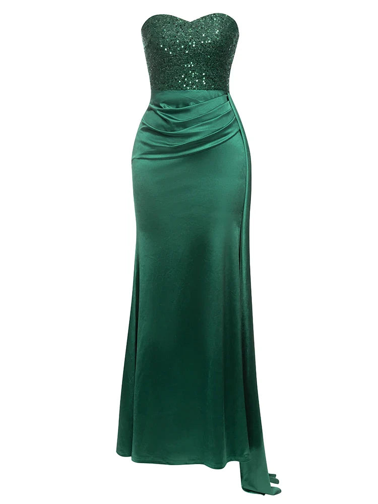 Green strapless evening gown with sequined top on a white background