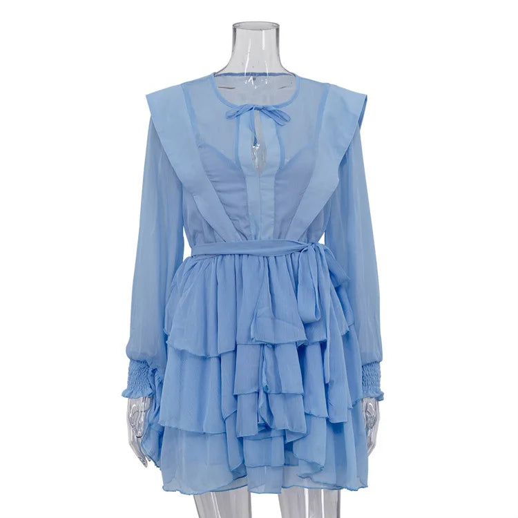 Light blue dress on a mannequin against a white background