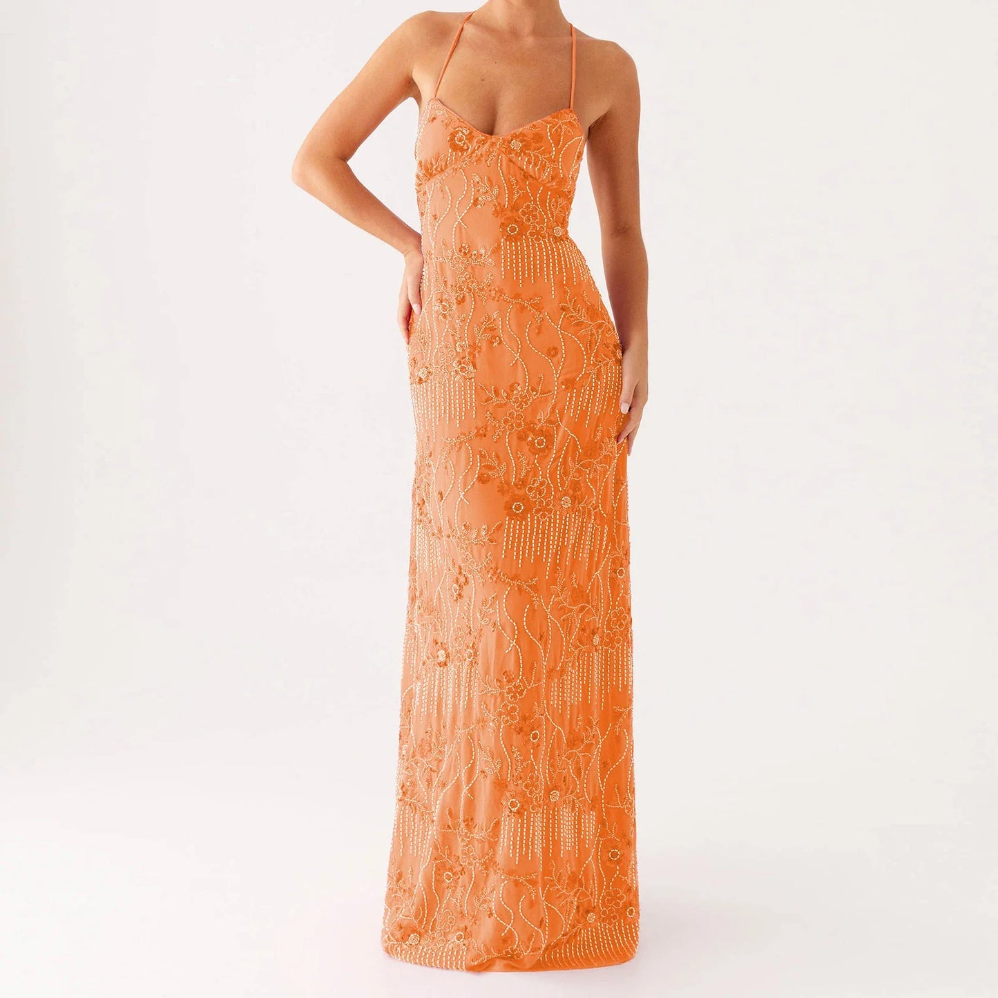 Orange lace dress on a white background