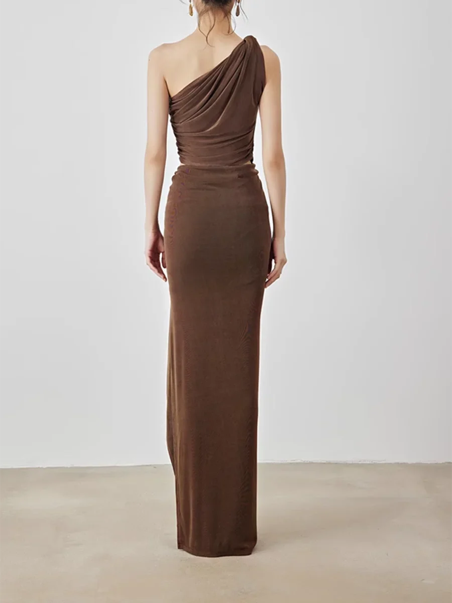 Brown one-shoulder evening gown on a plain background