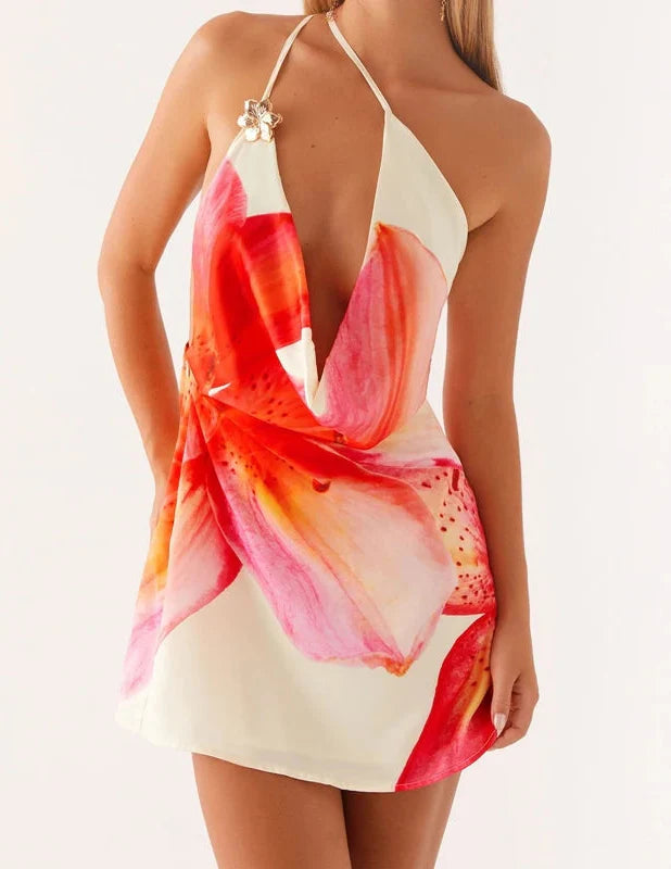 Woman wearing a colorful dress with a white background