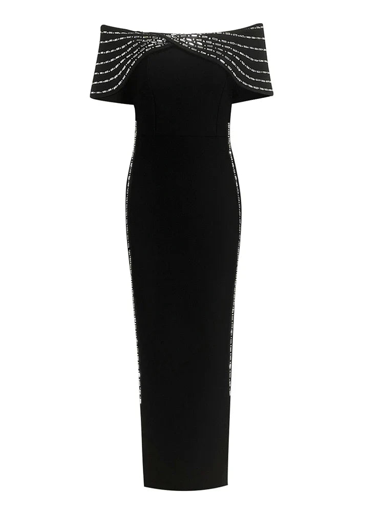 Black off-shoulder dress with decorative top on a white background