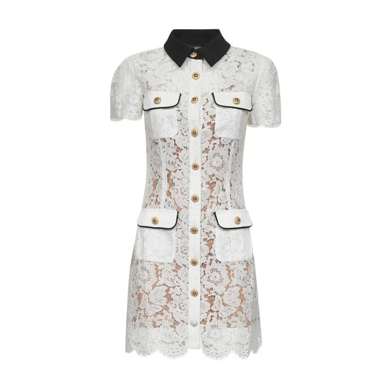 White lace dress with black collar and gold buttons on a white background