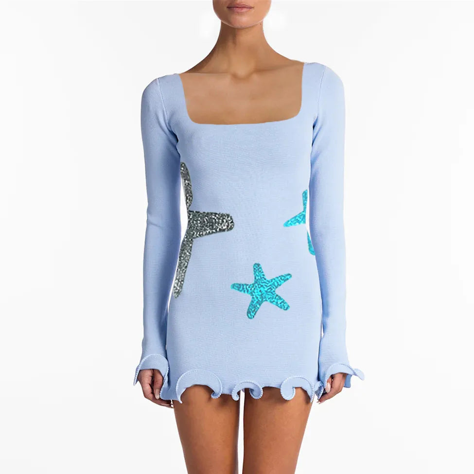 Light blue dress with starfish designs on a white background