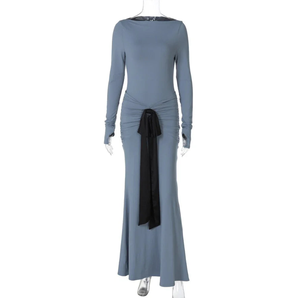 Long-sleeve blue dress with a black ribbon on a white background