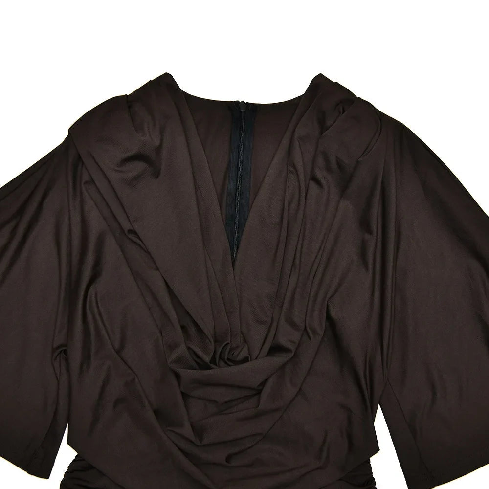 Brown dress with a deep neckline and long sleeves on a white background