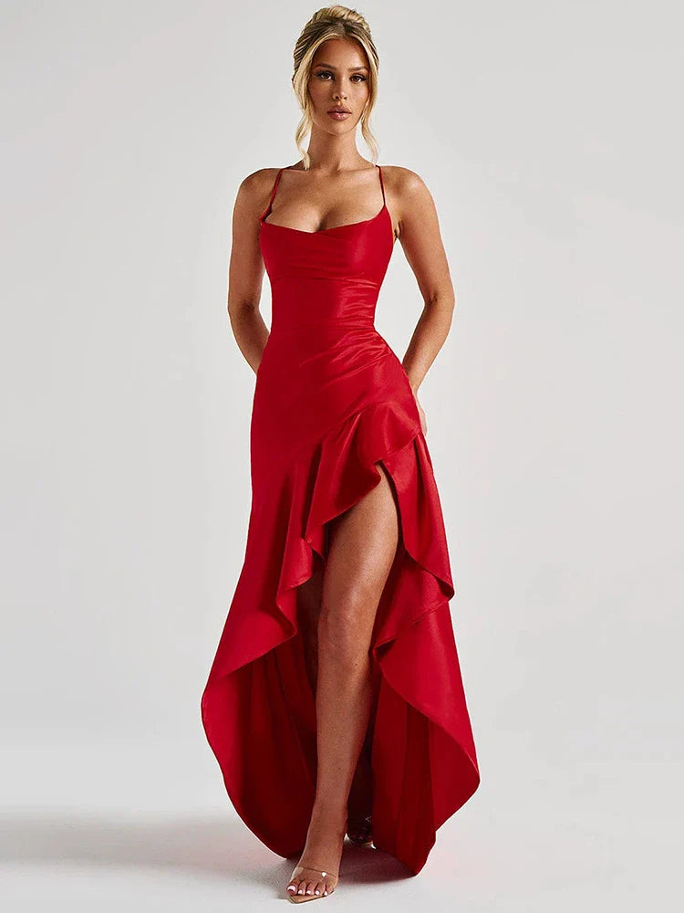 Woman wearing a red evening gown on a white background