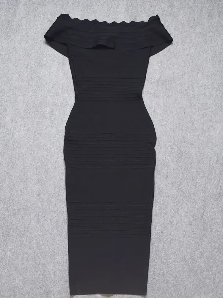 Black off-shoulder dress on a gray background