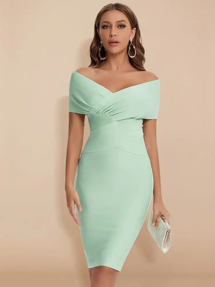 Mint green off-shoulder dress worn by a model on a beige background