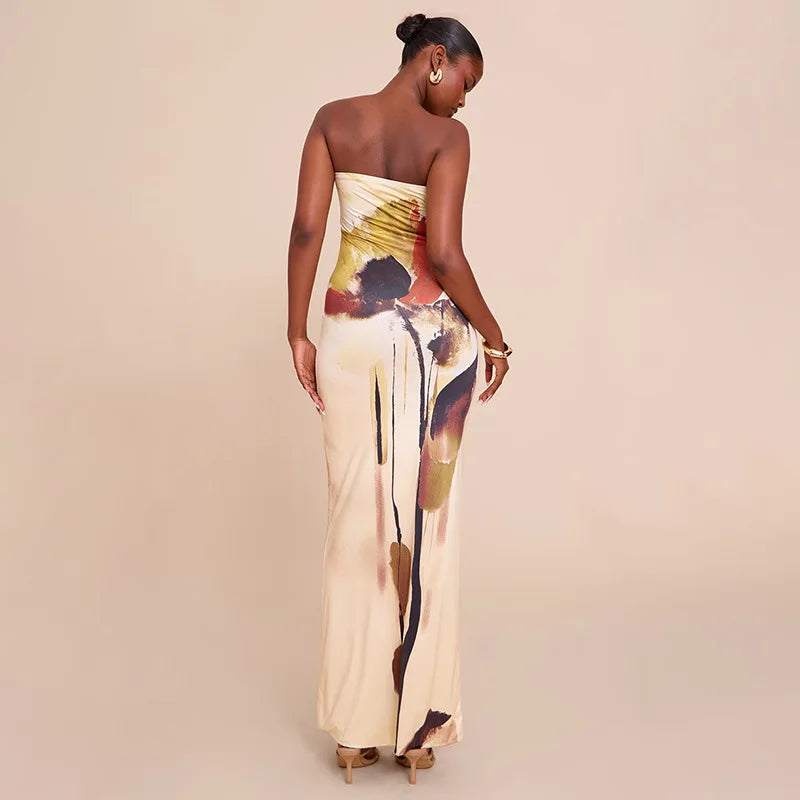 Woman wearing a strapless dress with abstract floral pattern on a beige background