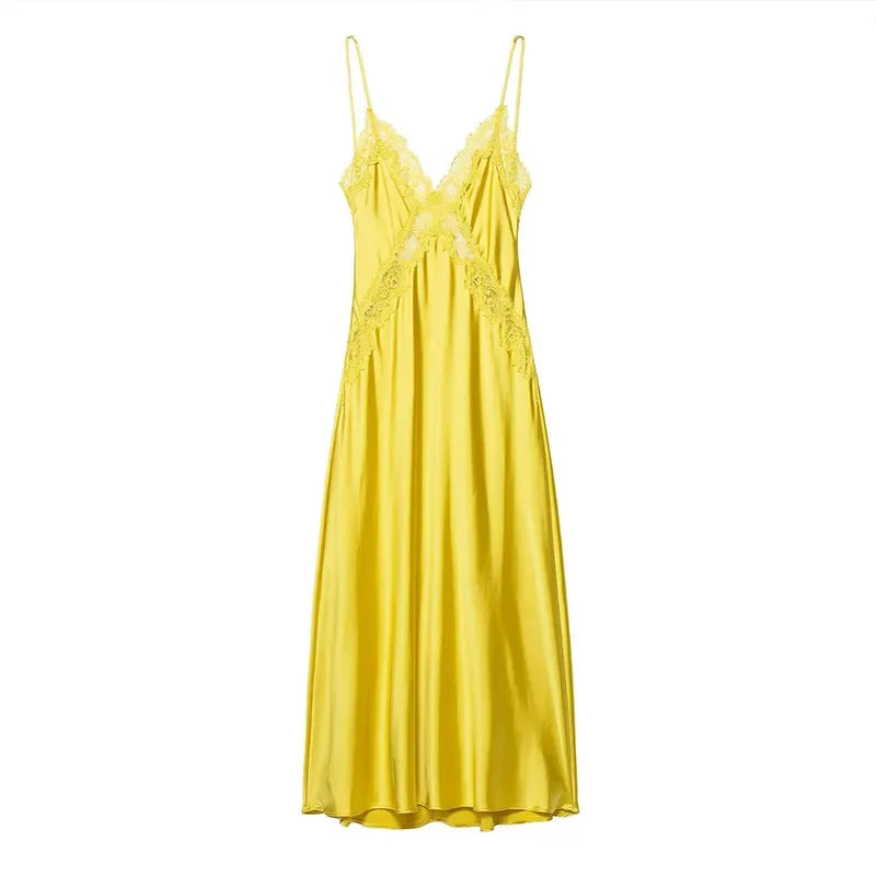 Yellow satin nightgown with lace details on a white background