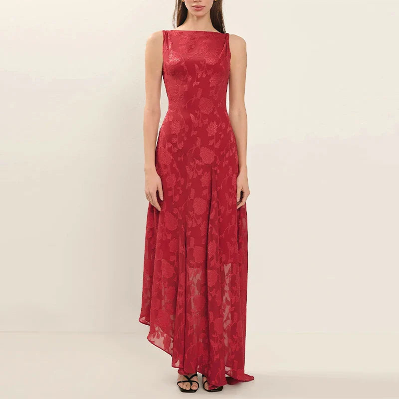 Red lace dress on a model against a plain background