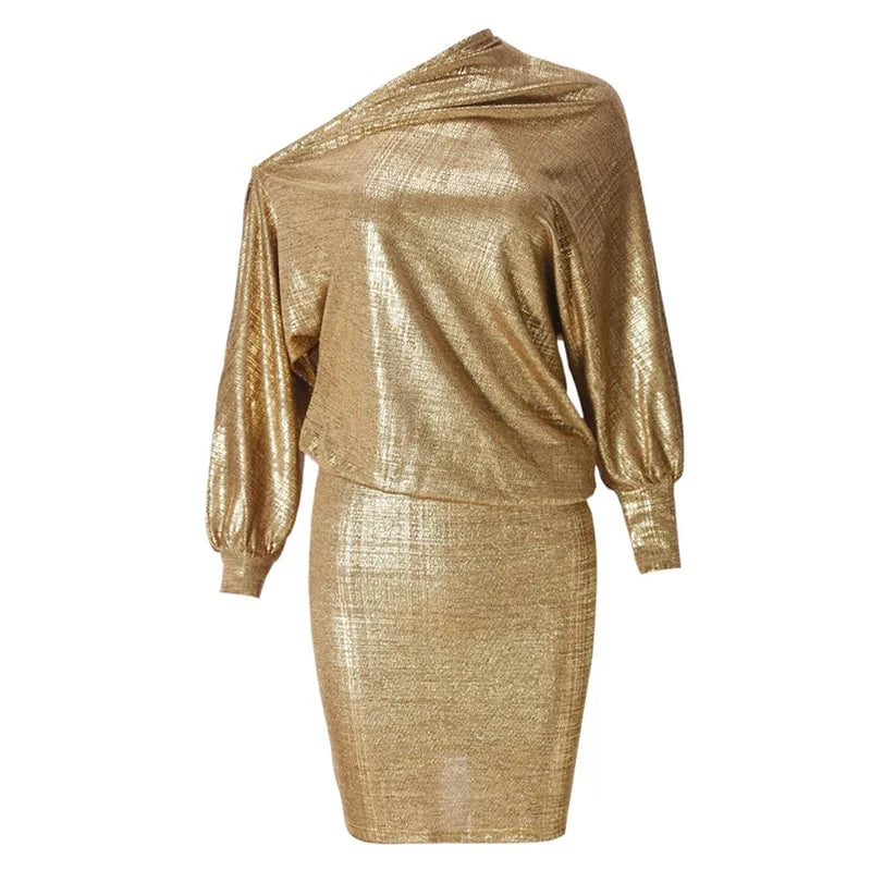 Gold metallic two-piece outfit on a white background
