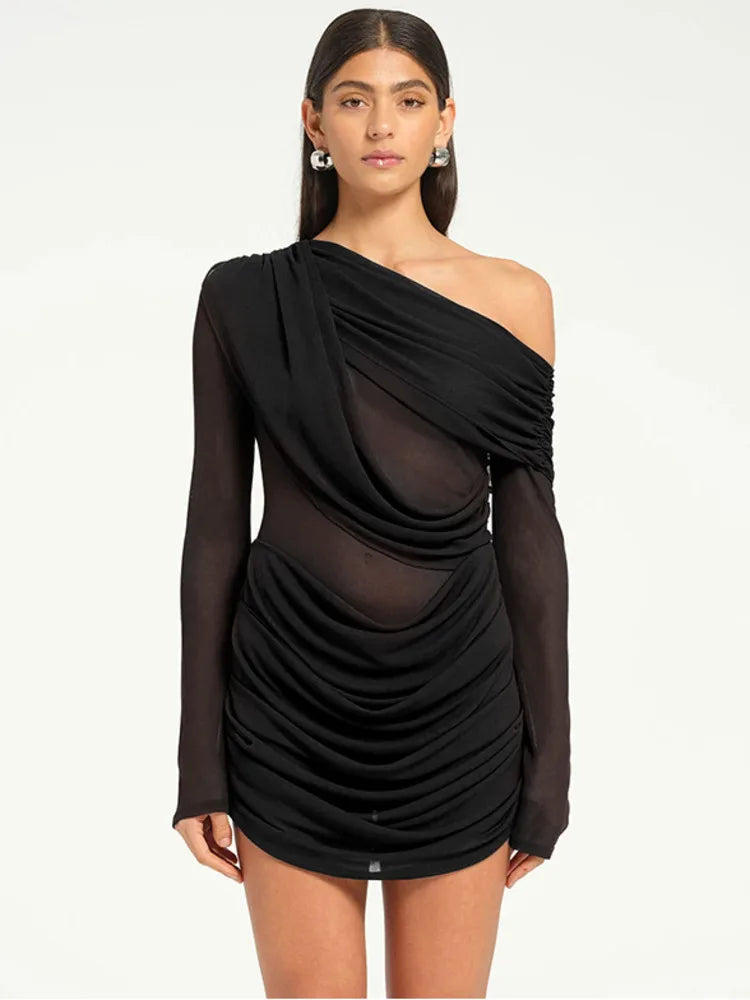 Black mesh draped one-shoulder mini dress styled for night out