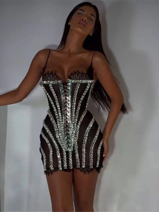 Black rhinestone bandage mini dress styled for evening parties