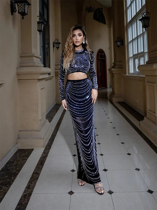 Black sequin crop top and maxi skirt set styled for formal events