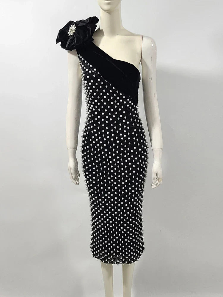 Black and white dot party midi gown styled for bold evening occasions