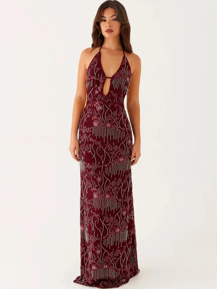 Burgundy sequin halter gown styled for formal events and weddings